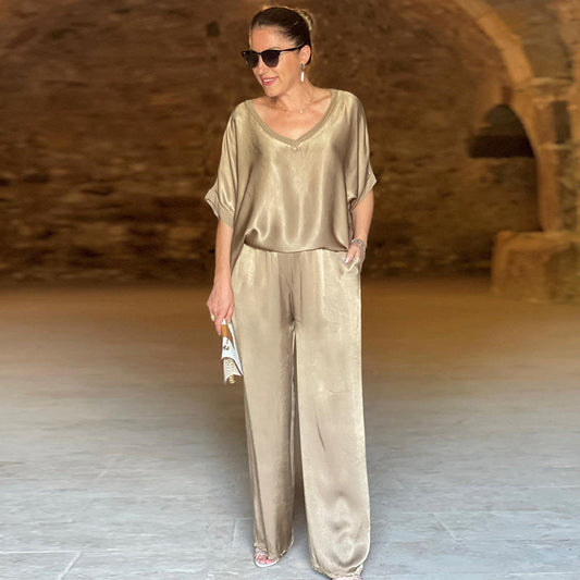 Elegancki dwuczęściowy błyszczący zestaw plus size z dekoltem w szpic