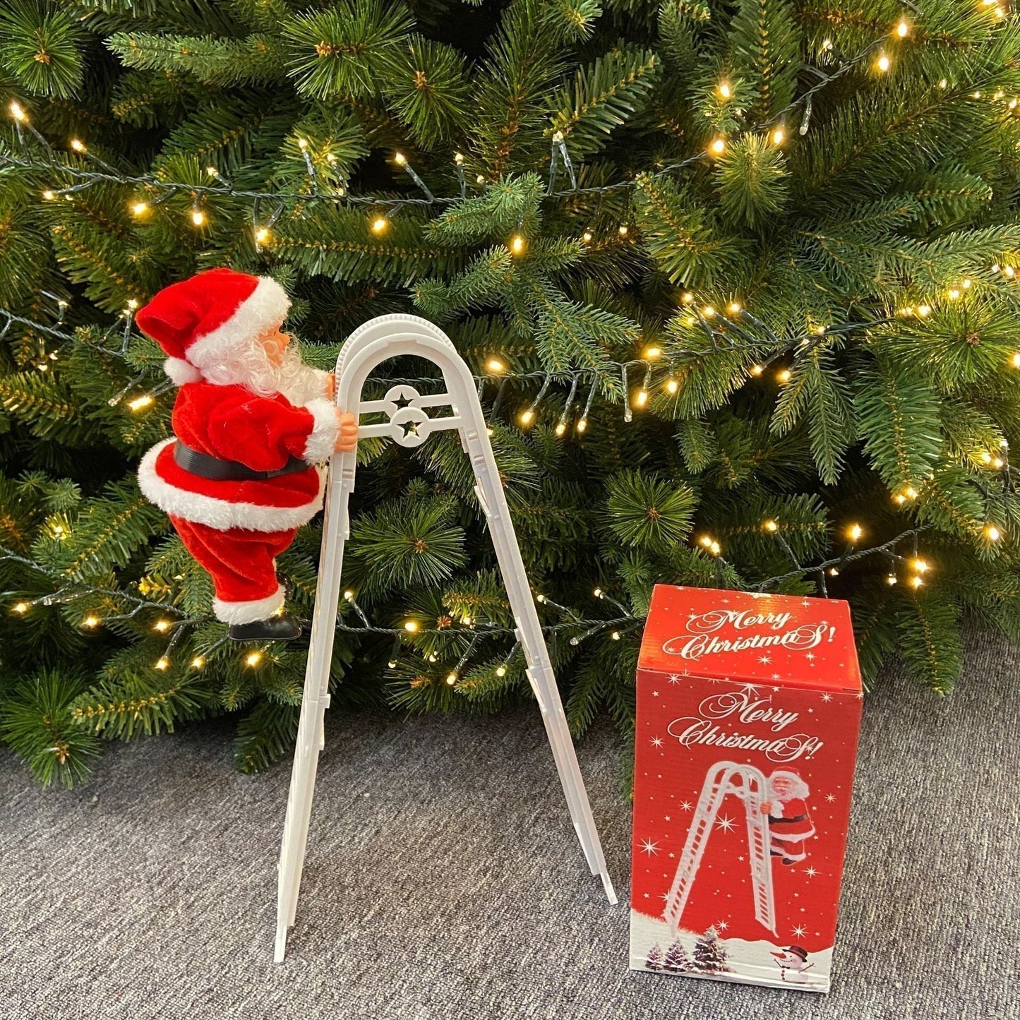🎄Elektryczna zabawka muzyczna przedstawiająca Świętego Mikołaja wspinającego się po kominie