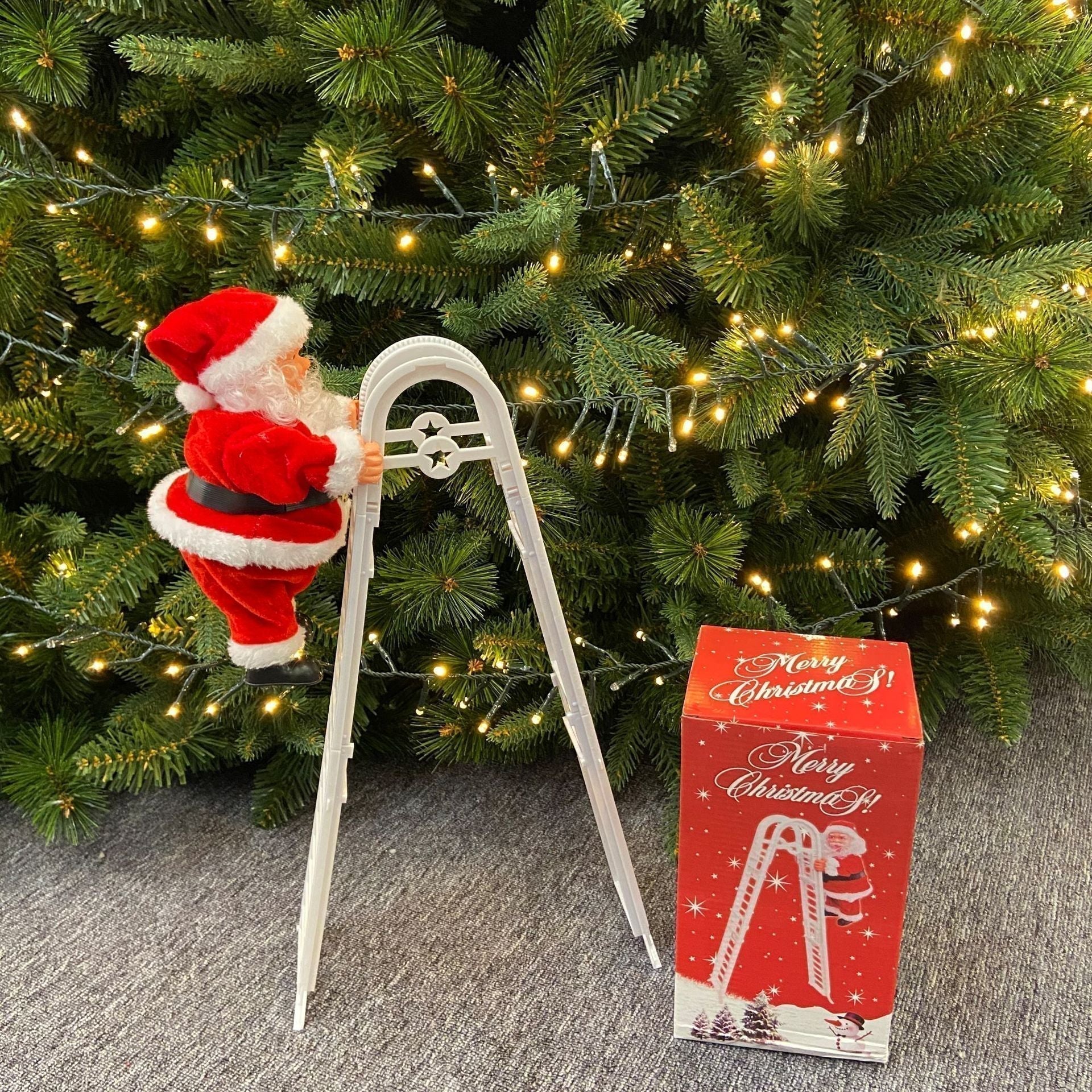 🎄Elektryczna zabawka muzyczna przedstawiająca Świętego Mikołaja wspinającego się po kominie