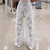 👖Modne dżinsy z koronkowymi naszywkami